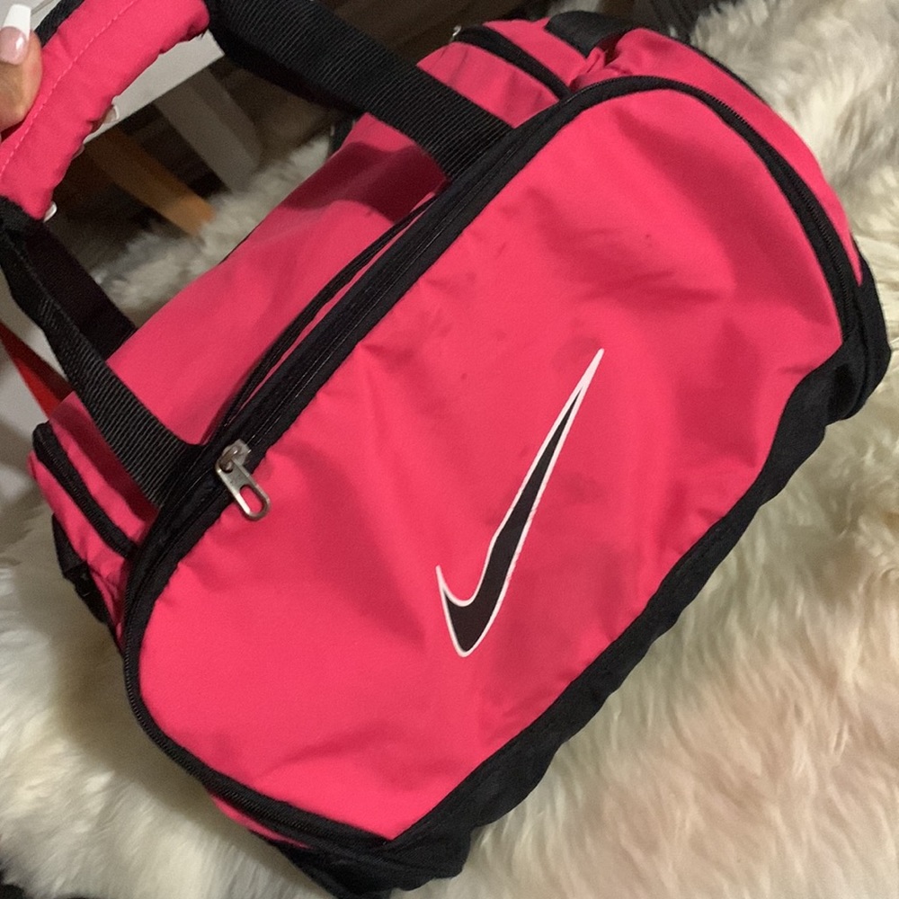 Nike pink small duffel bag